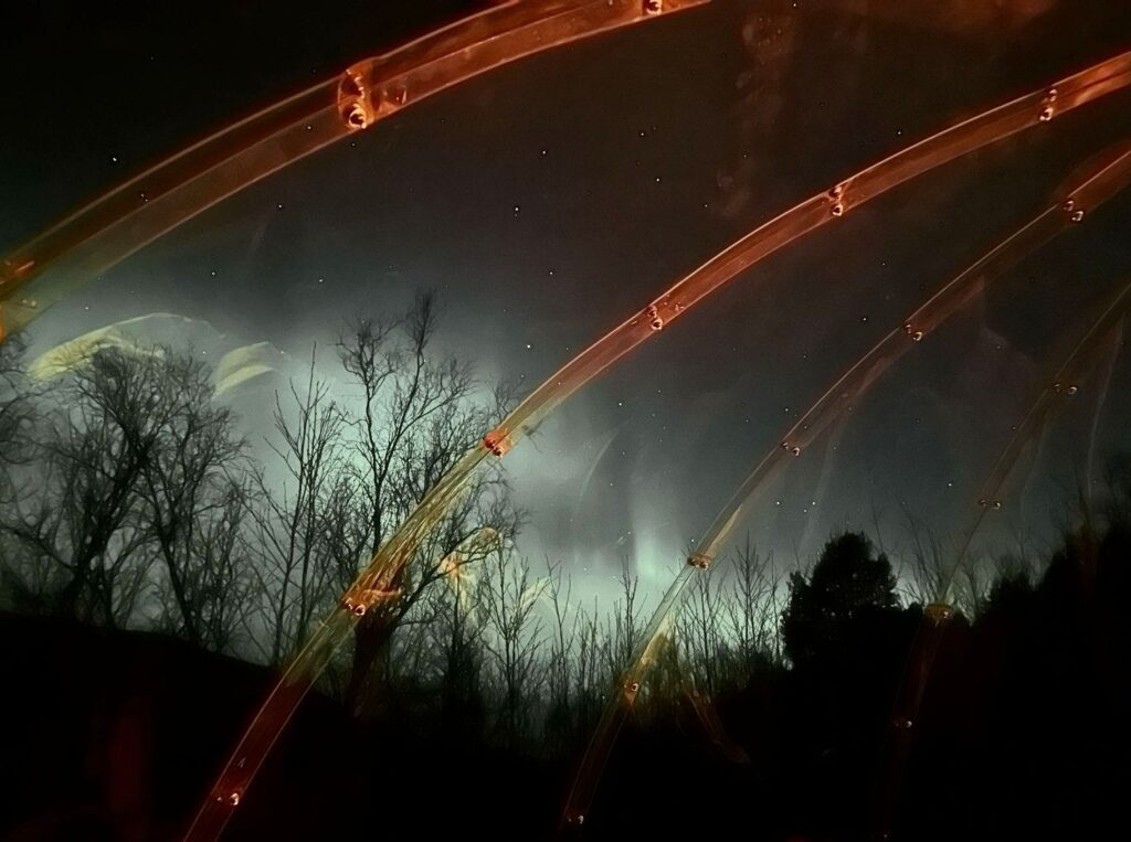 aurora from inside of the glass igloo